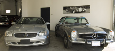 A pair of SLs await their owners after routine maintenance here in our Waltham, Massachusetts shop. On the left is a 2001 SLK 320, the one on the right is a 1970 280 SL low mileage southern car with a rare 5-speed transmission.